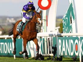 Corach Rambler, ridden by Derek Fox, winning Saturday's Grand National at Merseyside's Aintree Racecourse (Photo by Michael Steele/Getty Images)