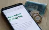 Energy bills are set to fall to their lowest level in more than two years from the start of April. Photo: PA