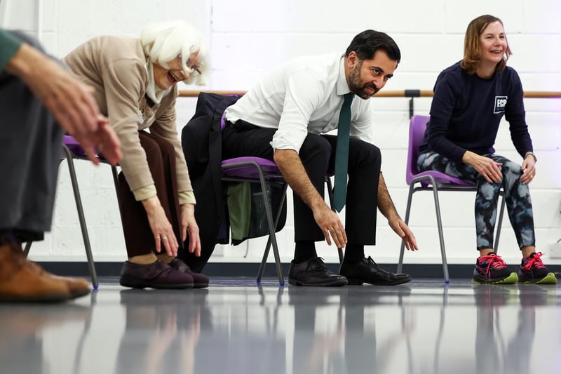 Humza Yousaf takes part in a dance performance during a visit to the Edinburgh Community Performing Arts re-connect project