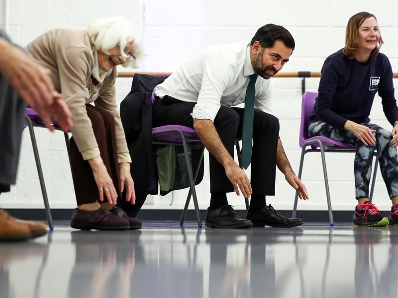 Humza Yousaf takes part in a dance performance during a visit to the Edinburgh Community Performing Arts re-connect project