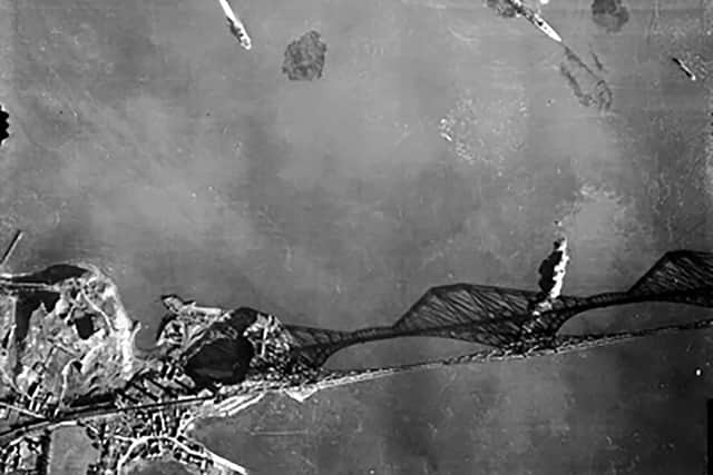 One startling image captures a Luftwaffe bombing raid on the Firth of Forth in 1939. Picture: Nigel Clarke