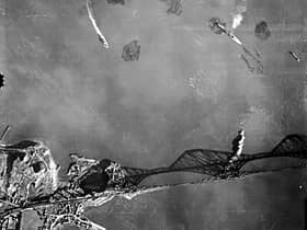 One startling image captures a Luftwaffe bombing raid on the Firth of Forth in 1939. Picture: Nigel Clarke