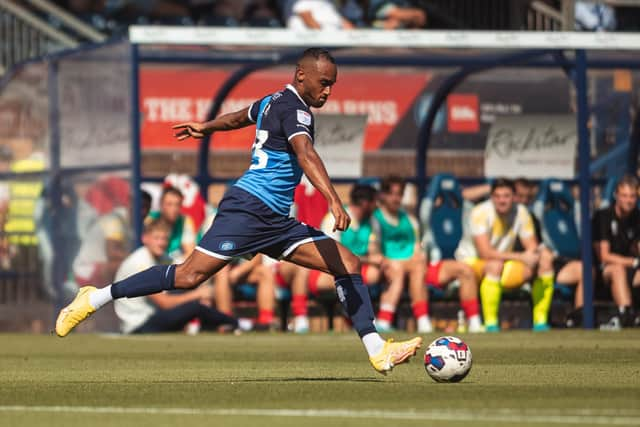 Hibs have signed left-back Jordan Obita from Wycombe Wanderers.