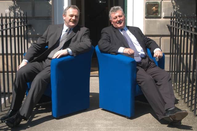 Rod Petrie (left) and Hearts chief executive Chris Robinson sitting in the sun after a press conference regarding sharing a new stadium at Straiton in 2003. (Cate Gillon)