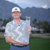 Amateur Nick Dunlap shows off the trophy after winning The American Express at Pete Dye Stadium Course in La Quinta, California. Picture: Orlando Ramirez/Getty Images.