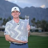 Amateur Nick Dunlap shows off the trophy after winning The American Express at Pete Dye Stadium Course in La Quinta, California. Picture: Orlando Ramirez/Getty Images.