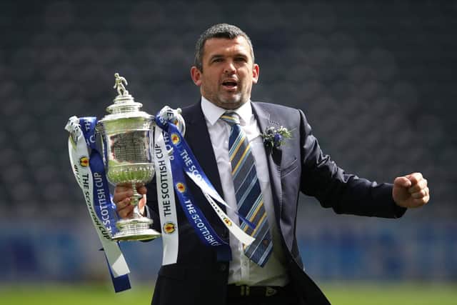 St Johnstone manager Callum Davidson holds the trophy after his team beat Hibs in the Scottish Cup Final at Hampden Park in May. Picture: Ian MacNicol/Getty Images.