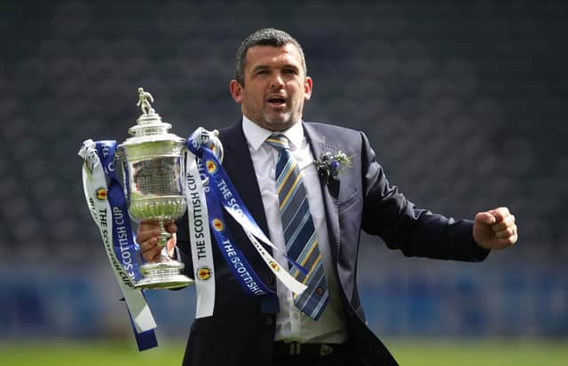 St Johnstone manager Callum Davidson holds the trophy after his team beat Hibs in the Scottish Cup Final at Hampden Park in May. Picture: Ian MacNicol/Getty Images.