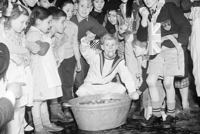 Bobbing for apples (or "dookin" for apples as we say in Scotland) is merely a fun game for kids to play on Halloween nowadays. In the past, however, apples were considered important in mysticism and fortune telling. For example, young women would peel an apple in one paring then throw it over their shoulders on Samhain Eve, the peeling would then take shape in the first initial of the man they were destined to marry.