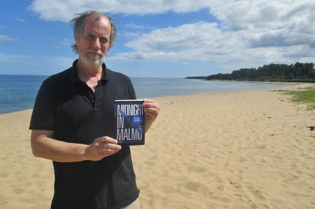 Author Torquil MacLeod on Anita's holiday beach for the launch of the fourth book in the series, Midnight in Malmo