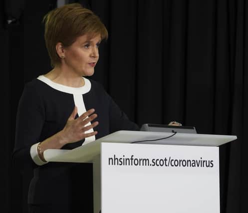 First Minister Nicola Sturgeon conceded the evidence supporting the use of face coverings was "relatively weak."