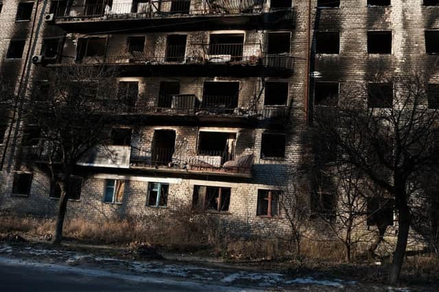 A building stands destroyed in the heavily damaged town of Izium, which was occupied by the Russian military following the invasion of Ukraine.