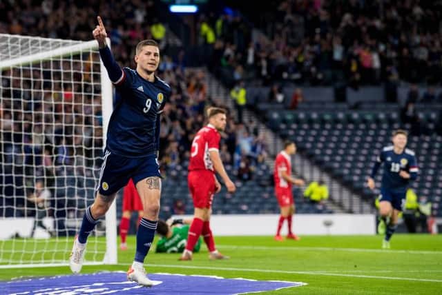Lyndon Dykes celebrates after scoring Scotland's goal in the 1-0 win over Moldova at Hampden. (Photo by Ross Parker / SNS Group)