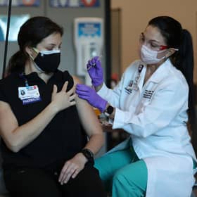 Covid vaccines has saved millions of lives worldwide (Picture: Joe Raedle/Getty Images)