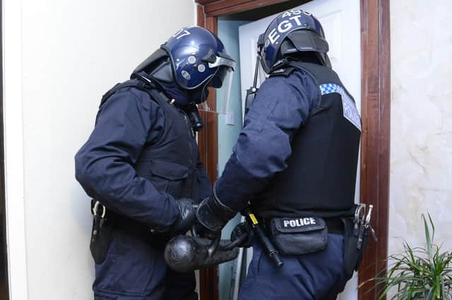 Police carry out a drugs raid in Edinburgh (Picture: Neil Hanna)