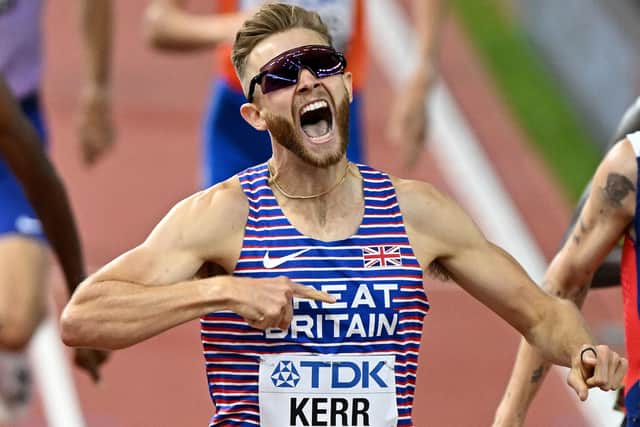 Josh Kerr celebrates after winning the men's 1500m final during the World Athletics Championships in Budapest. (Photo by ATTILA KISBENEDEK/AFP via Getty Images)