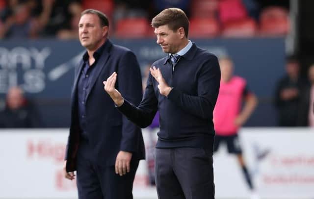 Rangers manager Steven Gerrard (right) will be looking to maintain his team's lead at the top of the Premiership when they face Malky Mackay's Ross County at Ibrox on Sunday afternoon. (Photo by Alan Harvey / SNS Group)