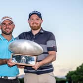 St Andrews man Alan Tulleth celebrates with Nathan Kimsey after helping the Englishman win the Rolex Challenge Tour Grand Final supported by The R&A at Club de Golf Alcanada in Mallorca. Picture: Octavio Passos/Getty Images.