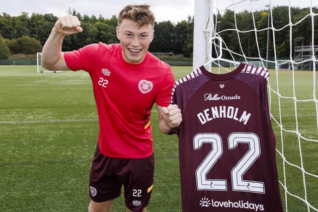 Hearts Aidan Denholm has signed a new contract at the club.