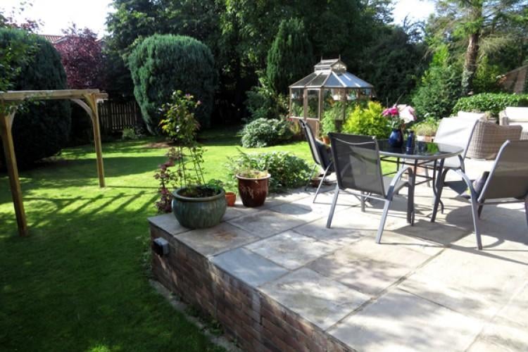 The south facing garden is ideal for the long summer nights.