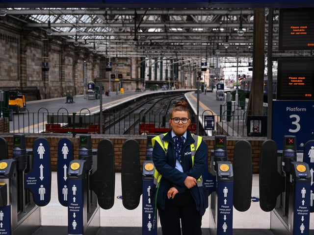 A Network Rail employee at Central Station on June 21, 2022 in Glasgow, Scotland. The biggest rail strikes in 30 years started on Monday night with trains cancelled across the UK for much of the week. Photo by Jeff J Mitchell/Getty Images