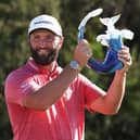 Jon Rahm celebrates with the trophy after winning the Sentry Tournament of Champions at Plantation Course at Kapalua Golf Club in Lahaina, Hawaii. Picture: Harry How/Getty Images.