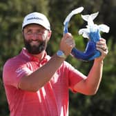 Jon Rahm celebrates with the trophy after winning the Sentry Tournament of Champions at Plantation Course at Kapalua Golf Club in Lahaina, Hawaii. Picture: Harry How/Getty Images.