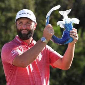 Jon Rahm celebrates with the trophy after winning the Sentry Tournament of Champions at Plantation Course at Kapalua Golf Club in Lahaina, Hawaii. Picture: Harry How/Getty Images.