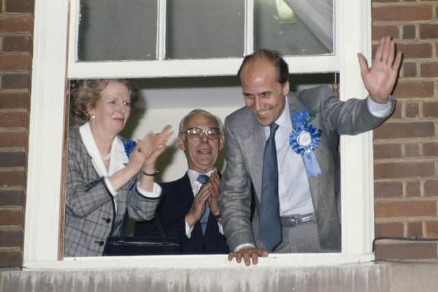 Then Conservative Party chairman Norman Tebbit, prime minister Margaret Thatcher and her husband Denis celebrate the Tories winning a third term in government on 11 June 1987 (Picture: Fox Photos/Hulton Archive/Getty Images)