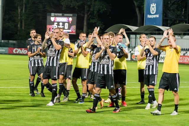 Players of Slovenian champions Mura celebrate after beating Shkendija of North Macedonia 5-0 in the second leg of their Champions League first qualifying round tie on Tuesday. (Photo by Jurij Kodrun/Getty Images)