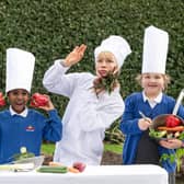 Schoolchildren from Forthview Primary celebrate the launch of the Edinburgh International Children’s Festival at the Royal Botanic Gardens with artist Suzi Cunningham ahead of the performance of ‘Soup,’ which will be part of the event's opening day celebration at the National Museum of Scotland. Picture: Julie Howden