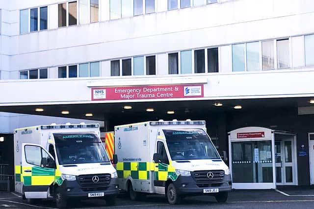 Scottish Government ministers have been accused of 'dangerous incompetence' after figures revealed over a third of ambulances are left waiting outside hospitals for more than an hour (Picture: PA)