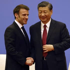 French President Emmanuel Macron, left, and Chinese President Xi Jinping take part in a Franco-Chinese business council meeting in Beijing. Picture: Ludovic Marin/Pool via AP