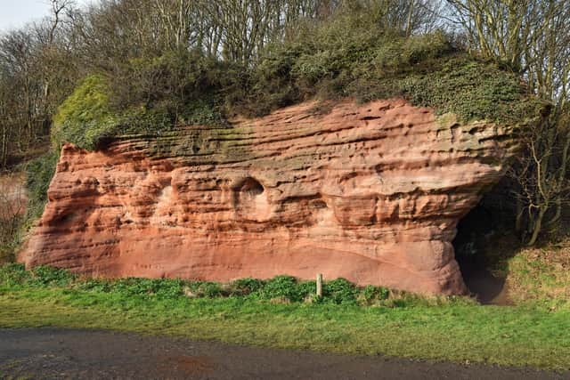 Court Cave near East Wemyss in Fife, part of the Fife Coastal Path. This sandstone cave contains prehistoric Pictish carvings on its walls.
