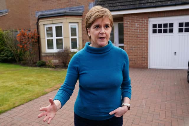 Nicola Sturgeon speaks to the media outside her home in Uddingston, after her husband, former SNP chief executive Peter Murrell, was 'released without charge pending further investigation' amid a police probe into the party's finances (Picture: Jane Barlow/PA)