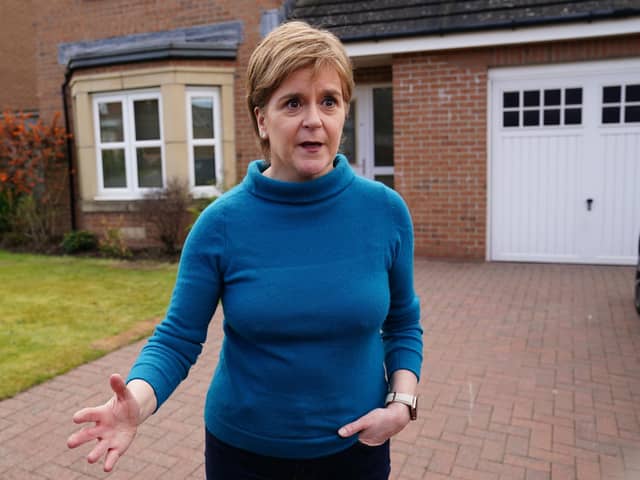 Nicola Sturgeon speaks to the media outside her home in Uddingston, after her husband, former SNP chief executive Peter Murrell, was 'released without charge pending further investigation' amid a police probe into the party's finances (Picture: Jane Barlow/PA)
