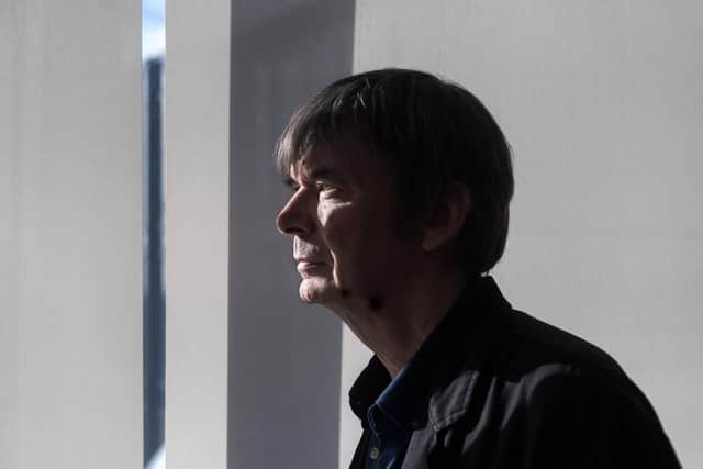 Author Ian Rankin looks out of the window from his Edinburgh high rise flat. His new standalone ebook The Rise, is published by Amazon Original Stories. Pic: John Devlin