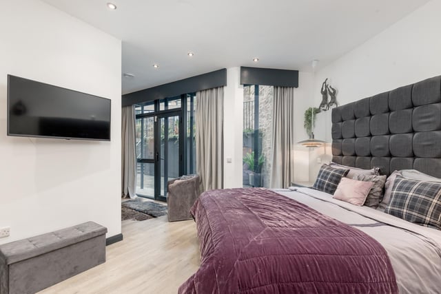 The existing sleeping quarters, three of which are ensuite, are on the ground floor and are all generously sized. One is currently being used as a gym, but is large enough to comfortably accommodate a double bedroom.
