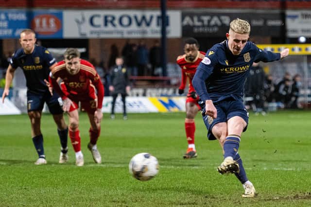 Dundee's Luke McCowan scores a penalty to seal a 1-0 win over Aberdeen at Dens Park. (Photo by Paul Devlin / SNS Group)