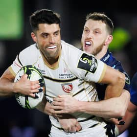 Gloucester's Adam Hastings, left, tries to evade the clutches of Mark Bennett of Edinburgh during the EPCR Challenge Cup match at Hive Stadium. (Photo by Ross Parker / SNS Group)