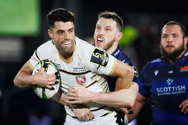 Gloucester's Adam Hastings, left, tries to evade the clutches of Mark Bennett of Edinburgh during the EPCR Challenge Cup match at Hive Stadium. (Photo by Ross Parker / SNS Group)