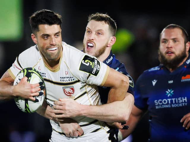 Gloucester's Adam Hastings, left, tries to evade the clutches of Mark Bennett of Edinburgh during the EPCR Challenge Cup match at Hive Stadium. (Photo by Ross Parker / SNS Group)