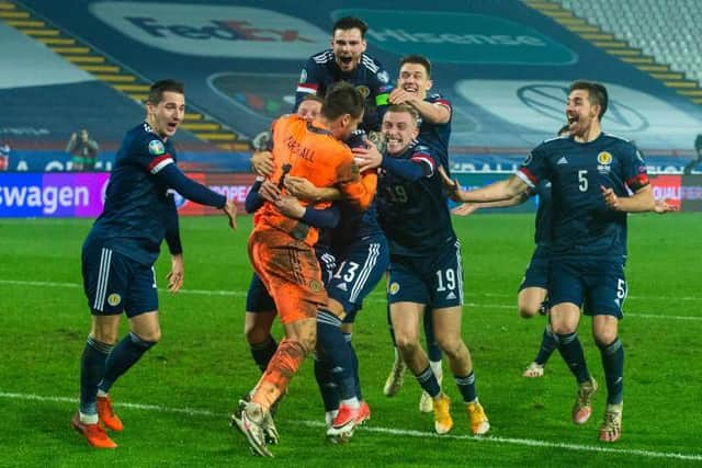 Turnbull and Lewis Ferguson watched the celebrations in Serbia a year ago from the under-21s hotel in Edinburgh (Photo by Nikola Krstic / SNS Group)