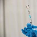 Pharmacist Kathie McDonough reconstitutes the Pfizer-BioNTech Covid-19 vaccine as she fills syringes Worcester, Massachusetts, April 2021. PIC: by Joseph Prezioso / AFP via Getty Images