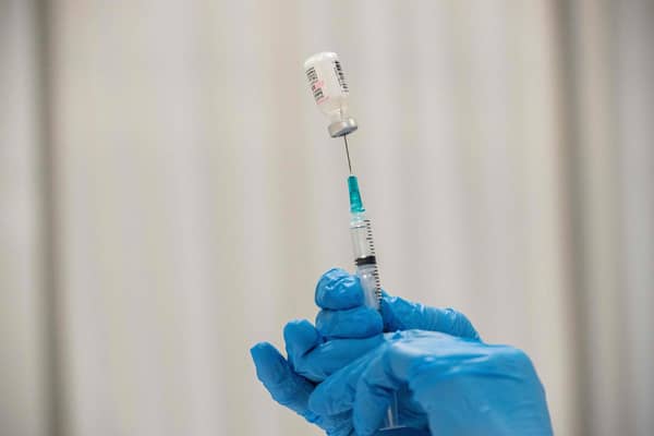 Pharmacist Kathie McDonough reconstitutes the Pfizer-BioNTech Covid-19 vaccine as she fills syringes Worcester, Massachusetts, April 2021. PIC: by Joseph Prezioso / AFP via Getty Images