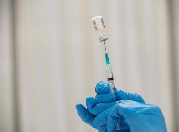 Pharmacist Kathie McDonough reconstitutes the Pfizer-BioNTech Covid-19 vaccine as she fills syringes Worcester, Massachusetts, April 2021. PIC: by Joseph Prezioso / AFP via Getty Images