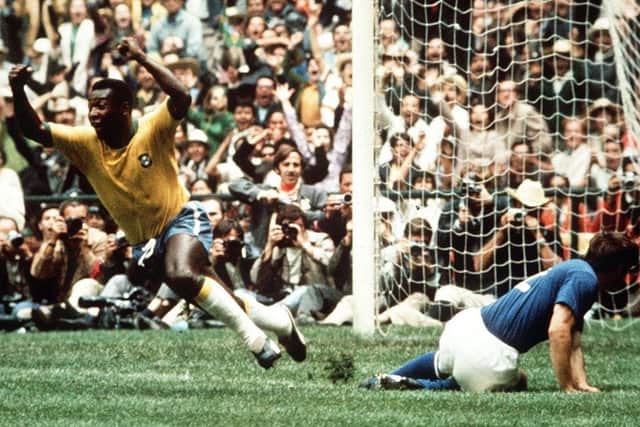 Pele celebrates scoring the first goal for Brazil in the 1970 World Cup final. Photo by Colorsport/Shutterstock