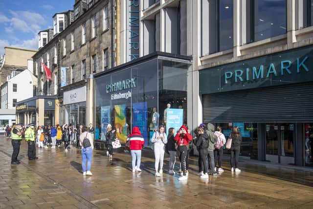 People queue outside the flagship Primark store on Princes Street in Edinburgh after it reopened following the initial spring lockdown. Picture: Jane Barlow/PA Wire
