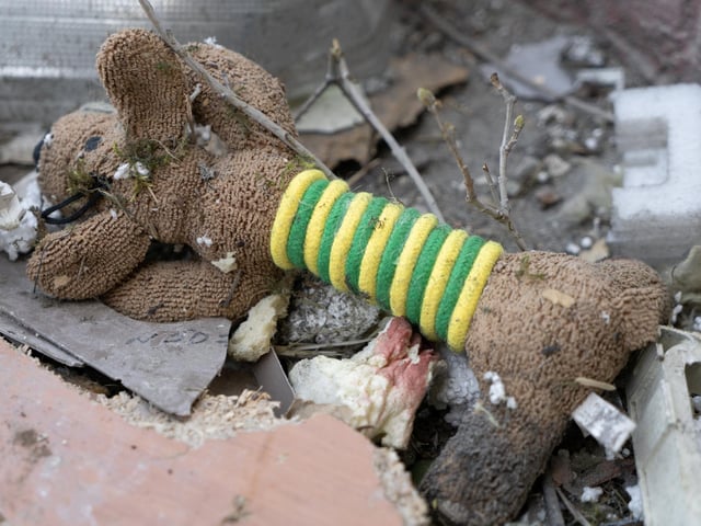 A dog's toy amid the debris outside an apartment block burnt by pieces of a fallen Russian missile in Kyiv's Obolon district.
Photojournalist Bennett Murray.