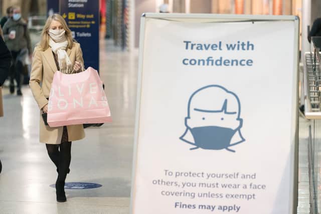 Commuters at Waterloo station, in London. The UK economy soared by record levels in 2021 as gross domestic product (GDP) rebounded by 7.5%, according to official figures. Picture: Dominic Lipinski/PA Wire